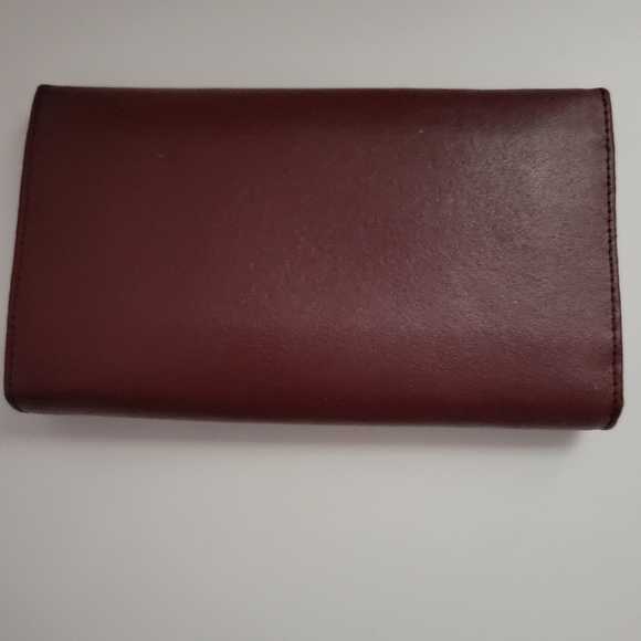 Cartier signature wallet with inside kiss lock and zipper pocket. EUC - Picture 7 of 13